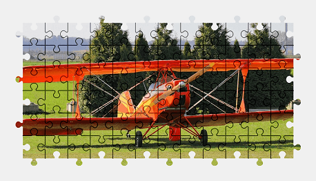Jigsaw puzzle online orange,plane,aircraft,vehicle,colorful