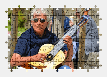 Jigsaw puzzle online guitar,musician,music,man,people,artist,colorful
