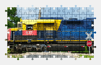 Jigsaw puzzle online locomotive,train,vehicle,road,sign,colorful